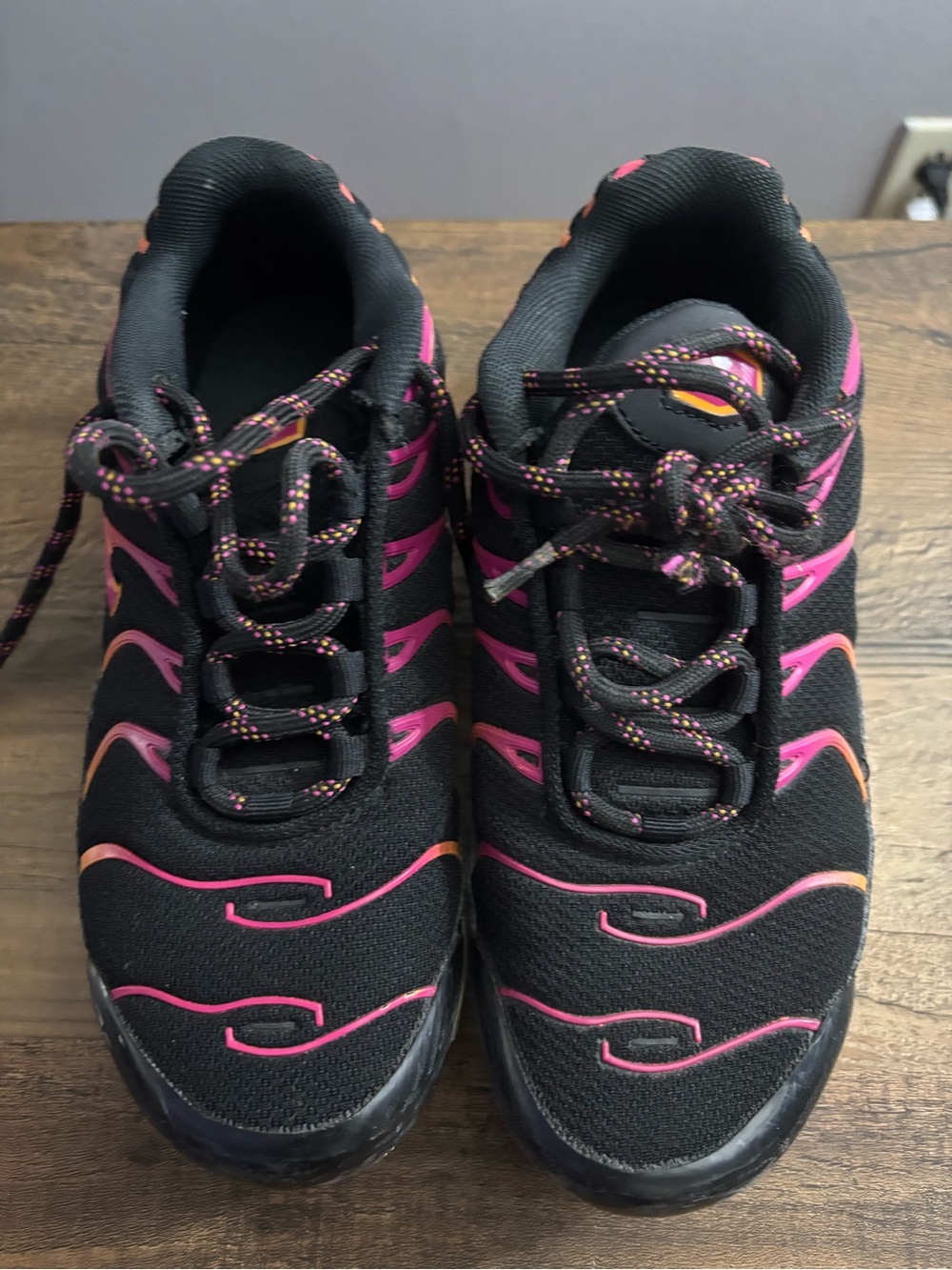 Nike Kids Black Sneakers with Pink and Orange Accents